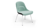 Bloom ergonomic office chair by Quell Design — pastel aqua / black upholstered contoured seat with linen-velvet and eco PU panels, mounted on slender black steel legs with subtle wraparound support structure. Elegant and sculptural, the chair adds refined comfort and modern design to contemporary interiors.