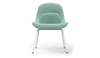 Bloom ergonomic office chair by Quell Design — pastel aqua upholstered contoured seat with linen-velvet and eco PU panels, mounted on slender black steel legs with subtle wraparound support structure. Elegant and sculptural, the chair adds refined comfort and modern design to contemporary interiors.