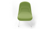 Bloom ergonomic office chair by Quell Design — green upholstered contoured seat with linen-velvet and eco PU panels, mounted on slender black steel legs with subtle wraparound support structure. Elegant and sculptural, the chair adds refined comfort and modern design to contemporary interiors.