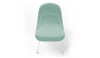 Bloom ergonomic office chair by Quell Design — pastel aqua upholstered contoured seat with linen-velvet and eco PU panels, mounted on slender black steel legs with subtle wraparound support structure. Elegant and sculptural, the chair adds refined comfort and modern design to contemporary interiors.