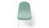 Bloom ergonomic office chair by Quell Design — pastel aqua / black upholstered contoured seat with linen-velvet and eco PU panels, mounted on slender black steel legs with subtle wraparound support structure. Elegant and sculptural, the chair adds refined comfort and modern design to contemporary interiors.