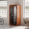 Quell Acoustic Soundproof pod in orange, modern office room and workspace